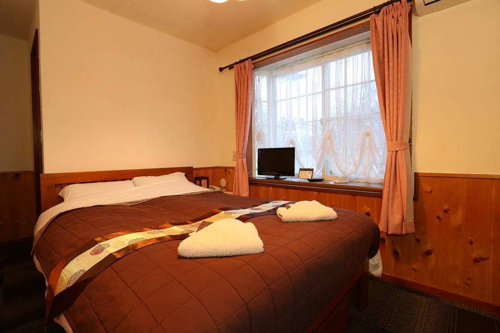 Alpine Wind Bed and Breakfast Χακούμπα Δωμάτιο φωτογραφία